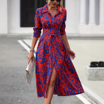 Red and blue leopard print wrap midi dress with three-quarter sleeves and tie waist