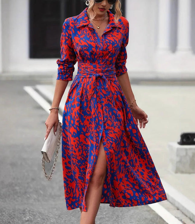 Red and blue leopard print wrap midi dress with three-quarter sleeves and tie waist