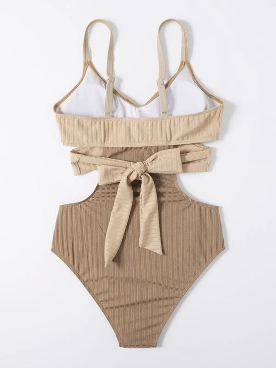 Back view of ribbed bathing suit women in beige with tie waist and scoop back