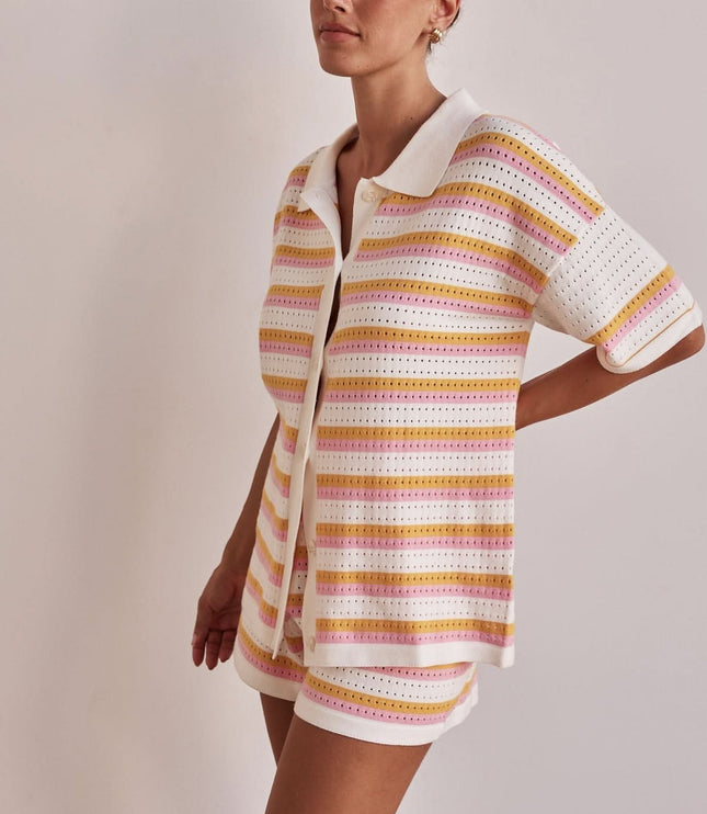 Side view of striped collared knit shirt and matching shorts set for women