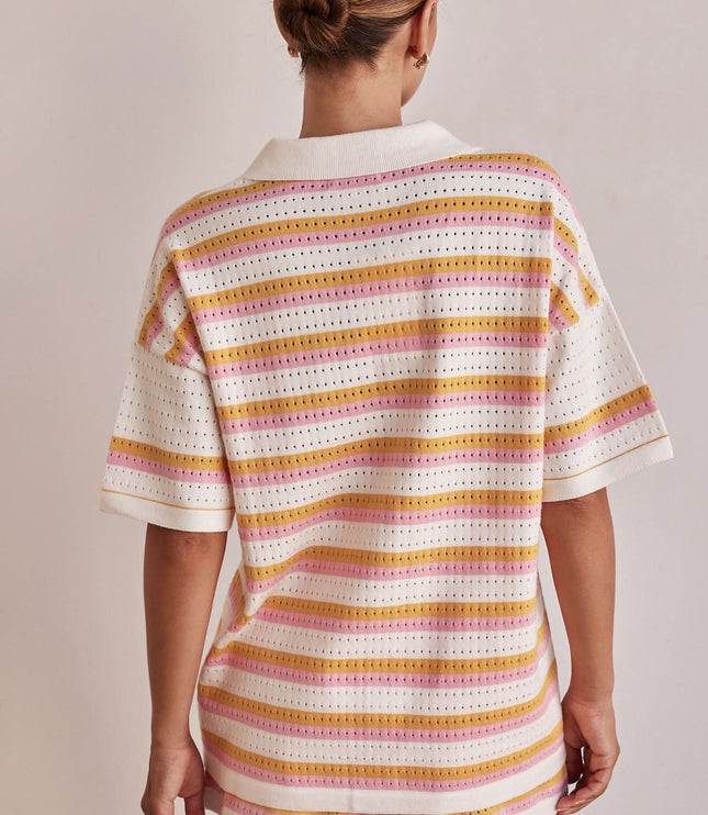 Back view of women's summer striped knit shorts set with short sleeve collared top