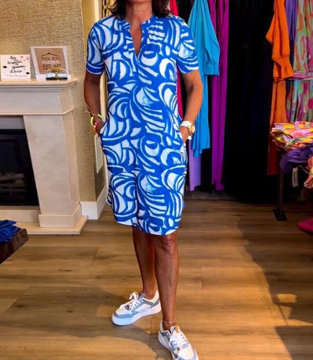 Blue and white abstract printed v-neck midi dress with short sleeves