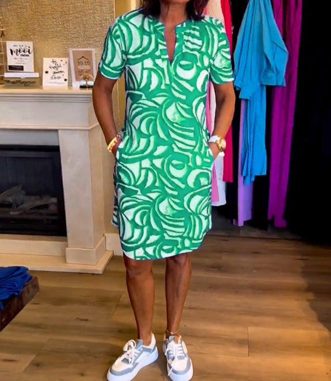 Green and white swirl printed v-neck midi dress with short sleeves