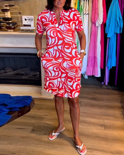 Red and white swirl printed v-neck midi dress with short sleeves