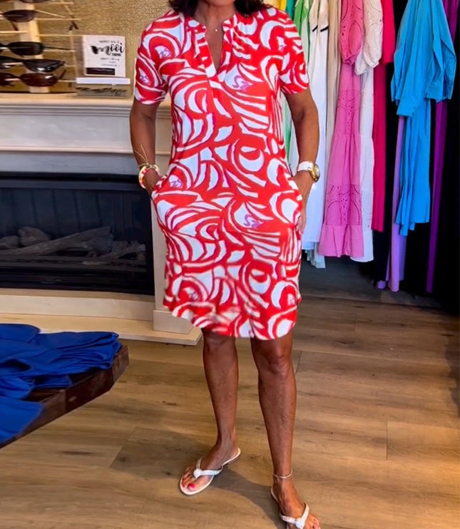 Red and white swirl printed v-neck midi dress with short sleeves