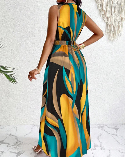 Back view of sleeveless maxi dress featuring abstract geometric pattern in teal and gold