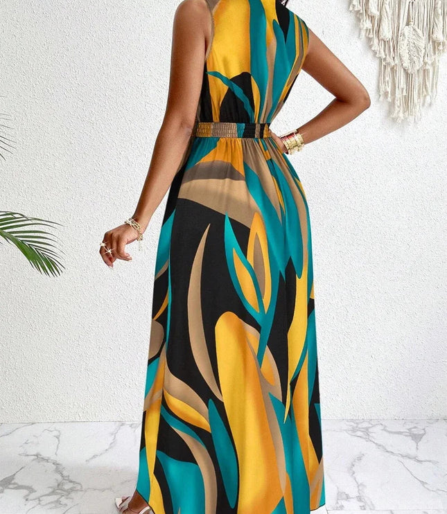 Back view of sleeveless maxi dress featuring abstract geometric pattern in teal and gold