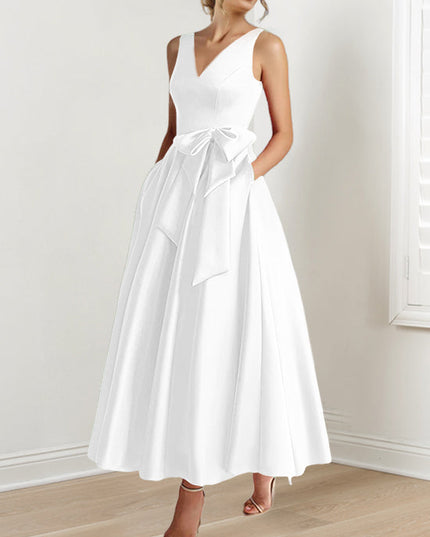 White sleeveless v-neck a-line satin maxi dress with bow waist detail