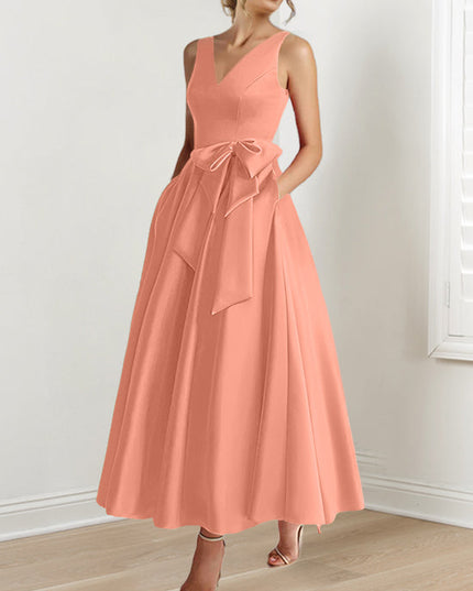 Coral satin A-line maxi dress with V-neckline and waist tie