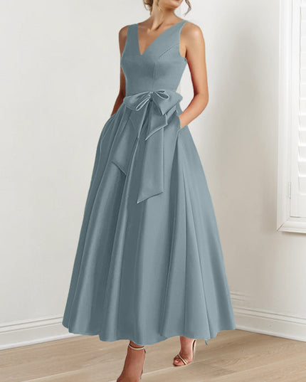 Slate blue sleeveless A-line satin maxi dress with bow detail