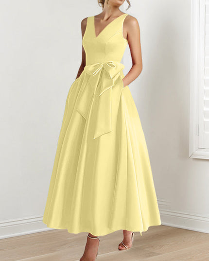 Yellow satin A-line maxi dress with V-neck and tie waist detail