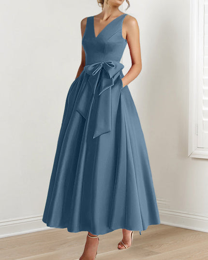 Slate blue A-line satin maxi dress with V-neck and bow at waist