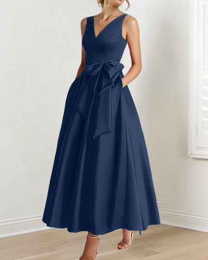 Navy sleeveless A-line satin maxi dress with V-neck and bow waist detail