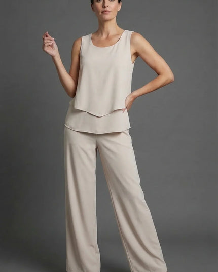 Beige sleeveless top with matching wide leg pants in a neutral summer co ord set