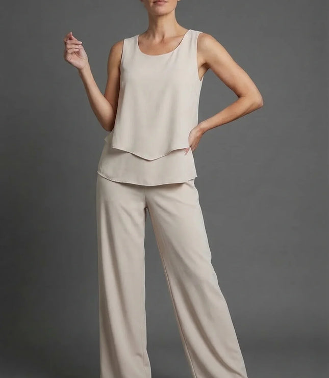 Beige sleeveless top with matching wide leg pants in a neutral summer co ord set