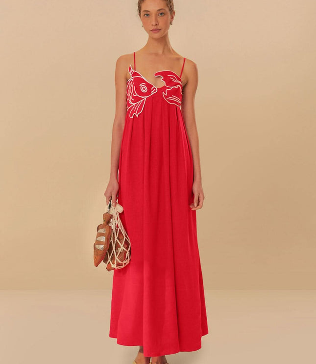 Red fish print maxi dress with spaghetti straps and flowing summer silhouette