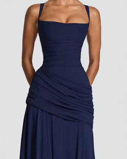 Navy blue formal maxi dress close-up showing sweetheart neckline and ruched asymmetrical waist