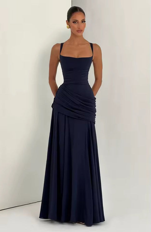 Navy sweetheart neckline asymmetrical maxi dress with ruched waist and flowing skirt
