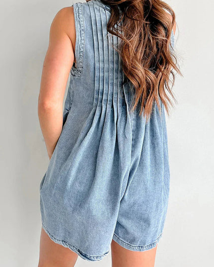 Back view of light wash denim dress with open back and pleats