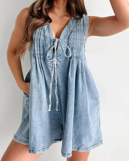Light blue denim mini dress with tie front v-neck and pleated bodice