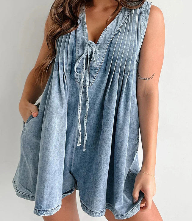 Denim mini dress front view showing tie closure and pocket details