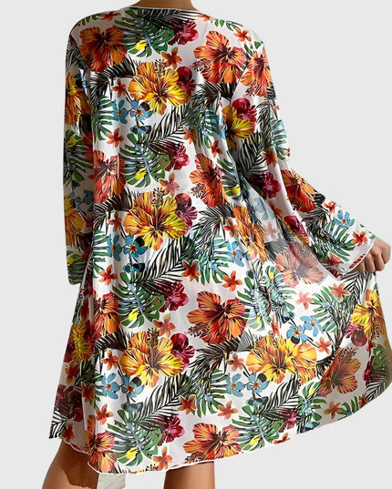 White tropical floral cover-up robe back view with long sleeves and flowing midi length