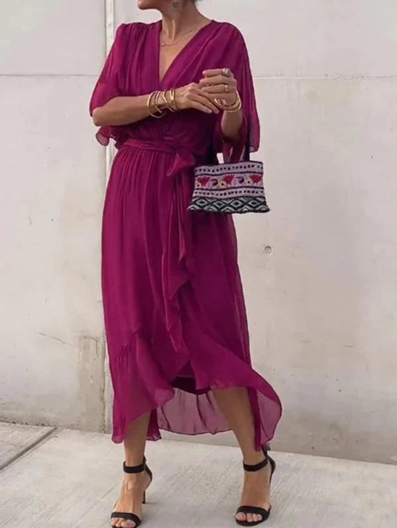 Magenta chiffon midi dress featuring v-neck, kimono sleeves, asymmetrical hem