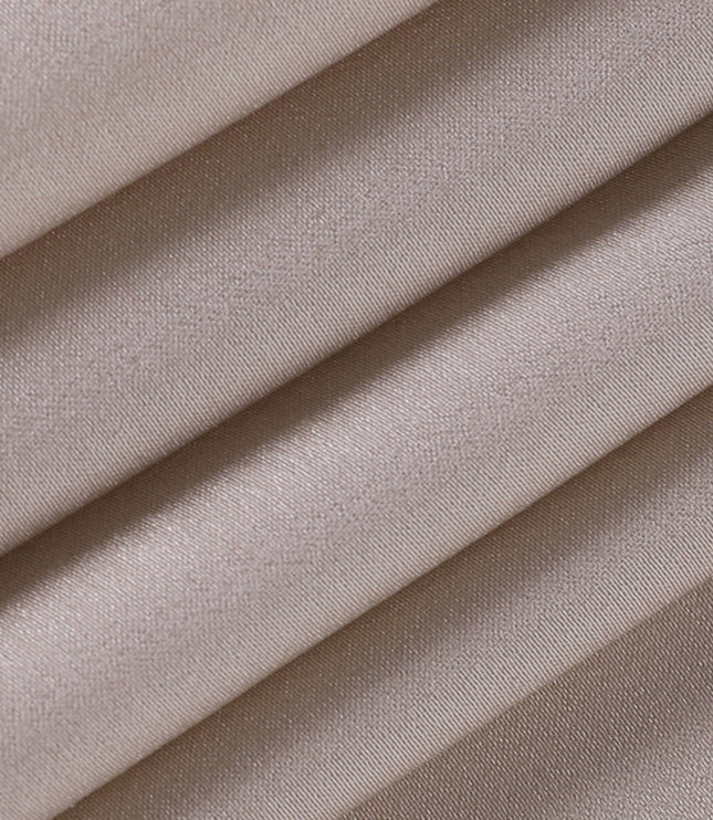 Detailed view of the smooth, champagne-colored satin fabric of the women's maxi slip dress, showing its luxurious texture.
