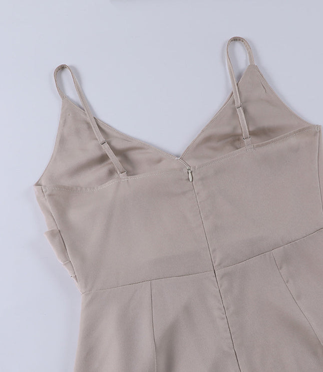 Back view of the champagne V-neck maxi slip dress, highlighting the fitted bodice and adjustable thin straps.