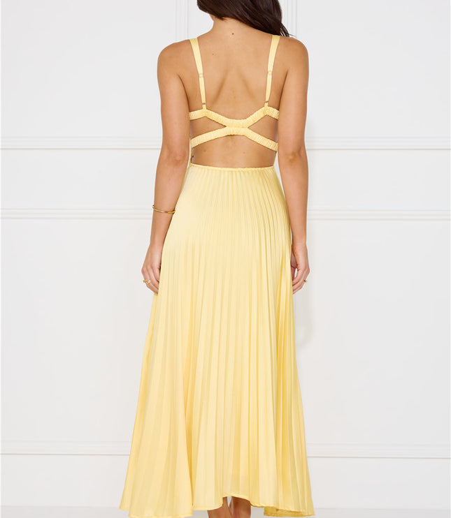 Rear detail of yellow maxi dress highlighting criss cross back cutout straps