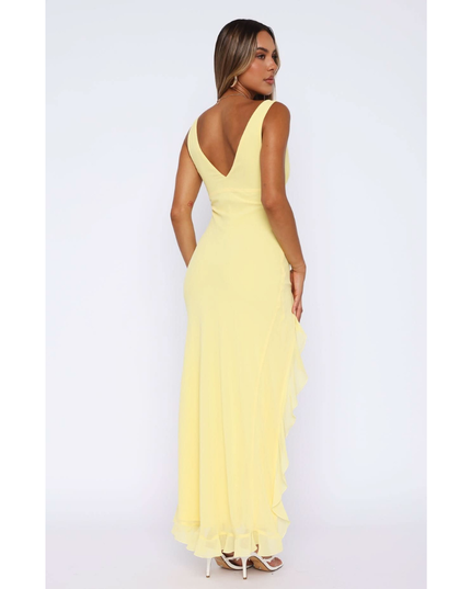 Back view of yellow sleeveless maxi dress with low v-neckline