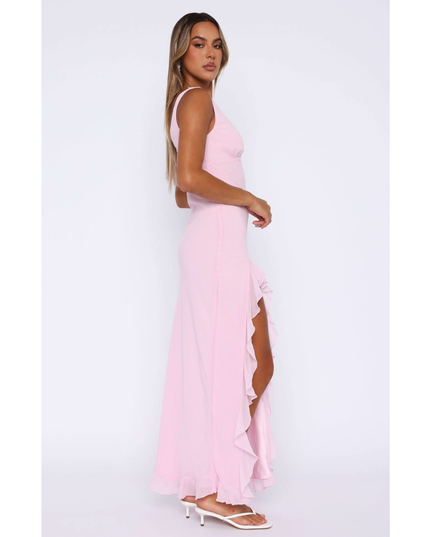 Side profile of pink sleeveless sundress with cascading ruffles