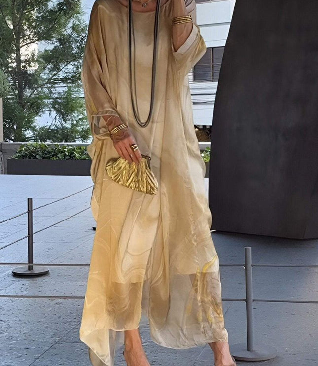 Beige abstract print maxi dress with sheer fabric and relaxed vacation silhouette