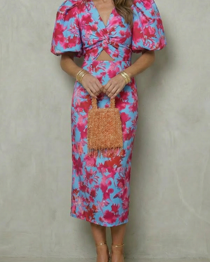 Women's abstract puff sleeve midi dress in blue and red floral print with cutout front detail