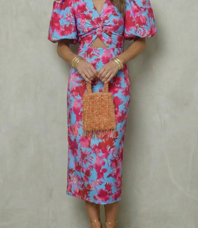 Women's abstract puff sleeve midi dress in blue and red floral print with cutout front detail