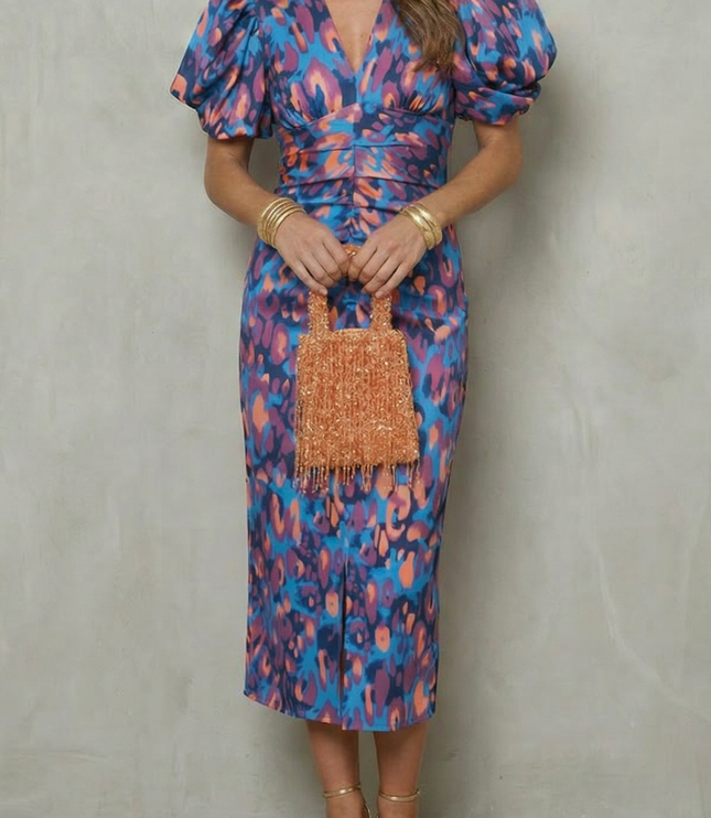 Women's abstract puff sleeve midi dress in blue and pink with deep V-neck and ruched waist