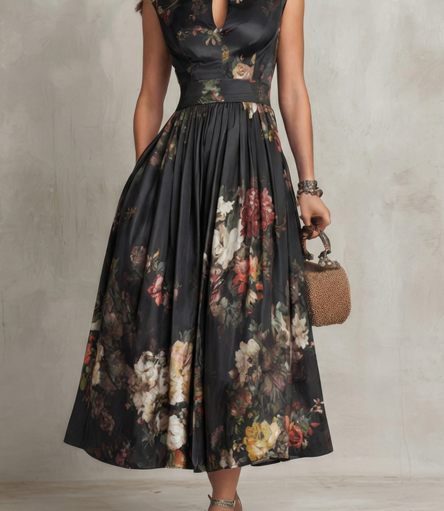 Front view of black floral midi dress with high neckline and sleeveless wedding guest style