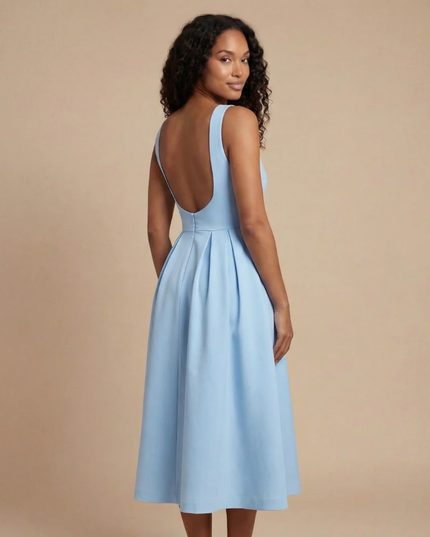 Back view of light blue midi dress showing low scoop back