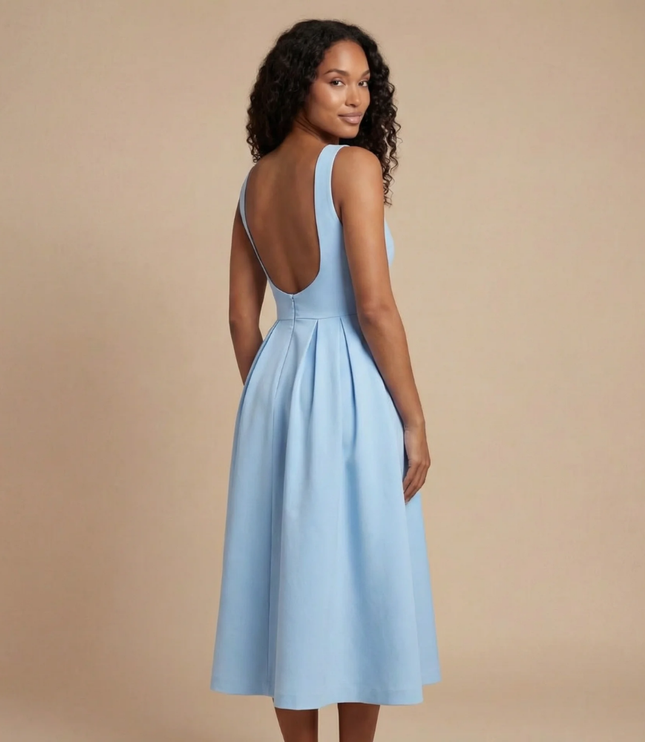 Back view of light blue midi dress showing low scoop back