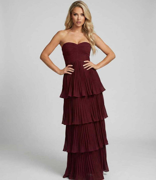 Burgundy strapless maxi dress with tiered pleated skirt for wedding guest