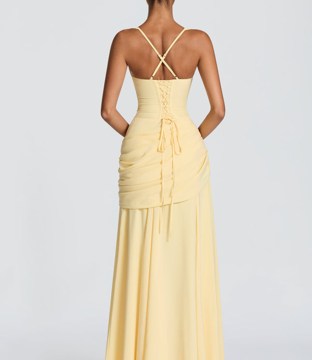Pale yellow cowl neck maxi dress with wide straps and ruched wrap skirt, front view formal dress