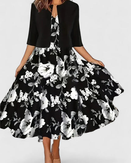 Black floral midi dress with white blossom print and short cardigan overlay