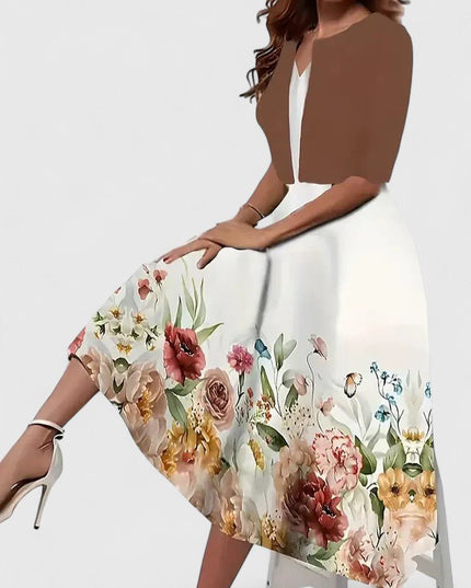 White floral midi dress with black panel and soft rose print with cardigan
