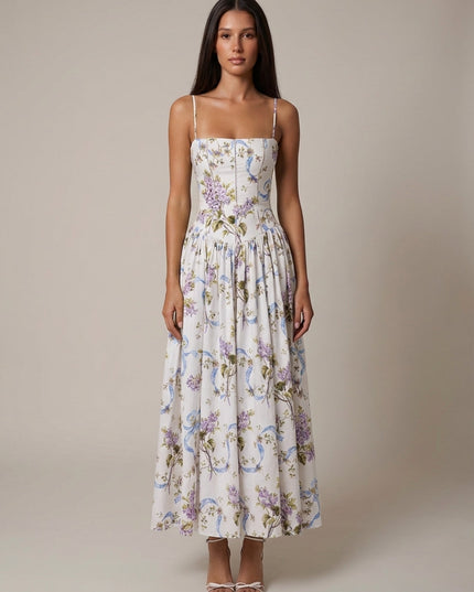 Women's white floral corset midi dress with purple blossoms, blue vine print, and fitted midi silhouette