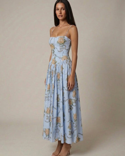 Women's blue floral corset midi dress with large flower print, square neckline, and pleated midi skirt