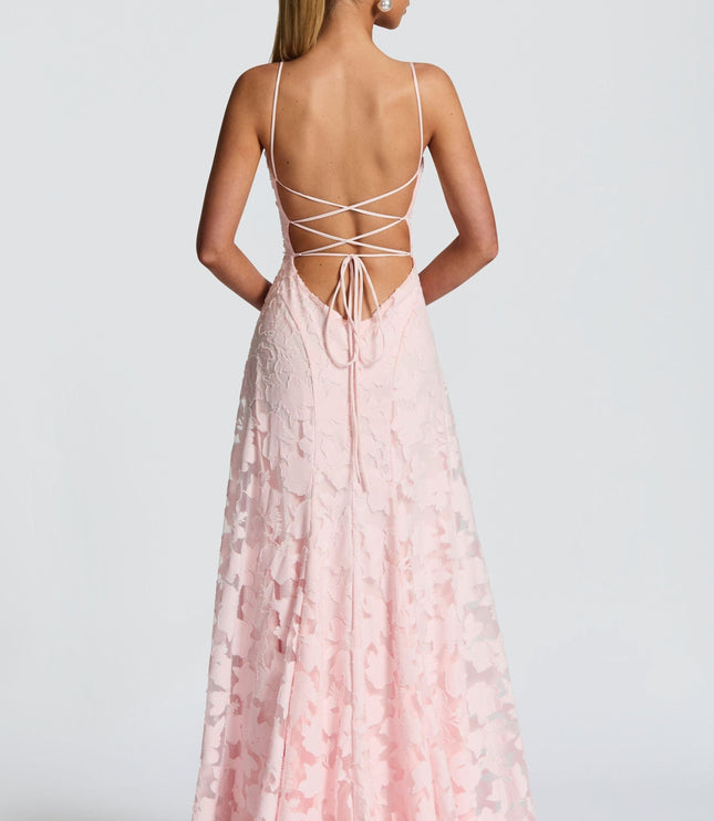 Back view of pink floral maxi dress with crisscross lace-up detail
