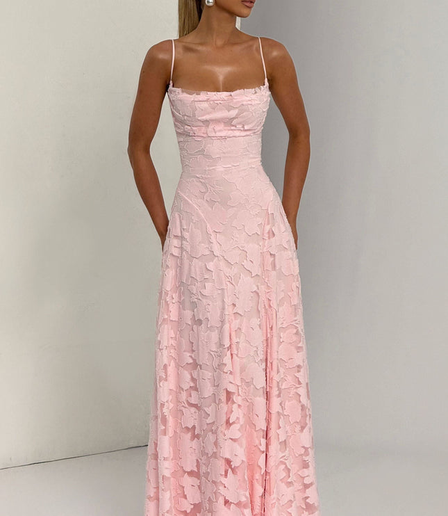 Close-up of pink floral lace texture on cowl neck maxi dress bodice