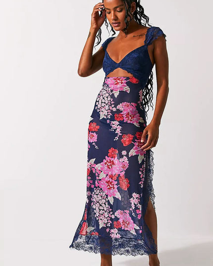 Navy floral cutout midi dress with lace bodice, side slit, and sheer hem for wedding guest attire