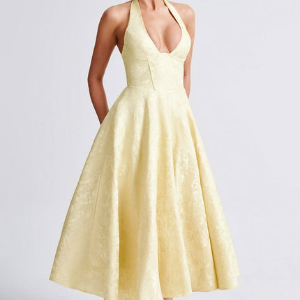 Pale yellow halter midi dress with floral jacquard and full skirt