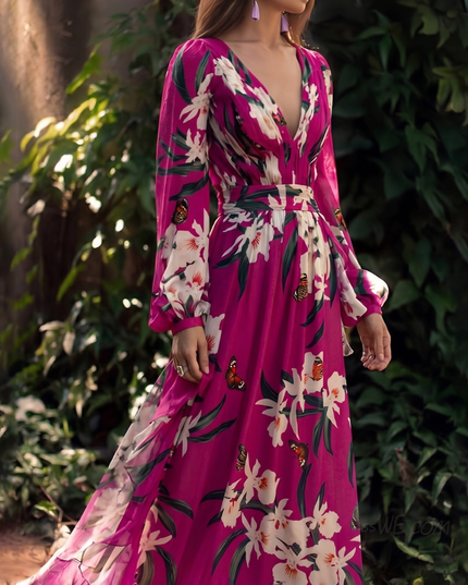 Side view of magenta floral maxi dress with deep V neck, long sleeves, and waist tie detail